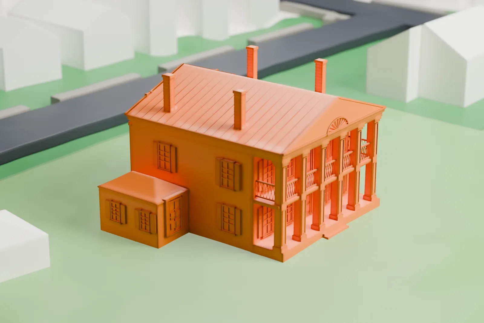 A white 3D print of the Seguine Mansion, a two-story house with a columned porch and tall chimneys, standing on an open green lawn with a few small buildings nearby.