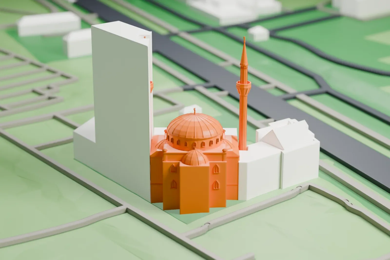 A white 3D print of the Şehitlik Mosque among the surrounding city buildings of Berlin.