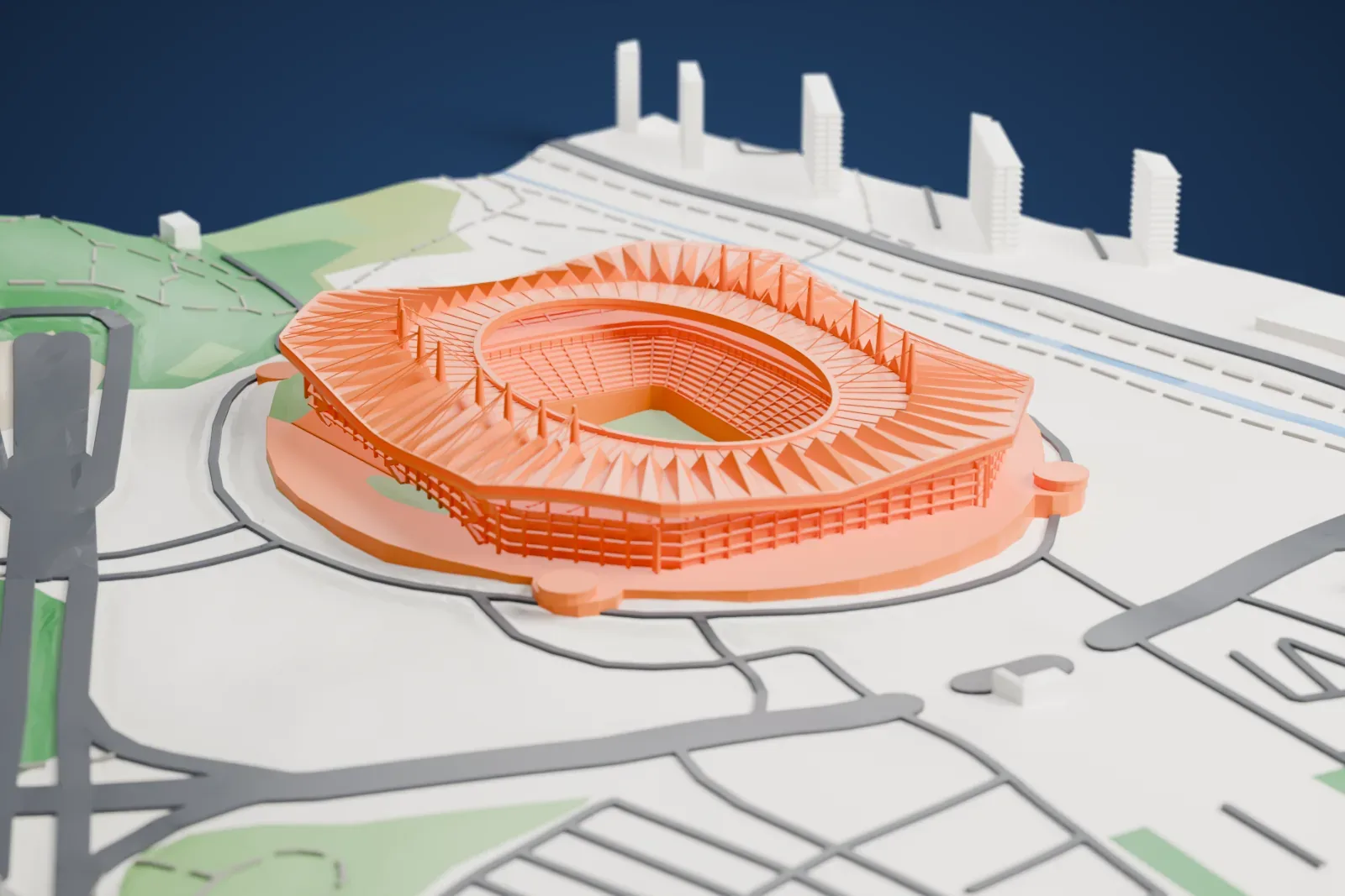 A white 3D print of the Seoul World Cup Stadium, its kite-shaped roof lifted on sixteen masts above a two-tier bowl on a round podium, among the surrounding streets and buildings.