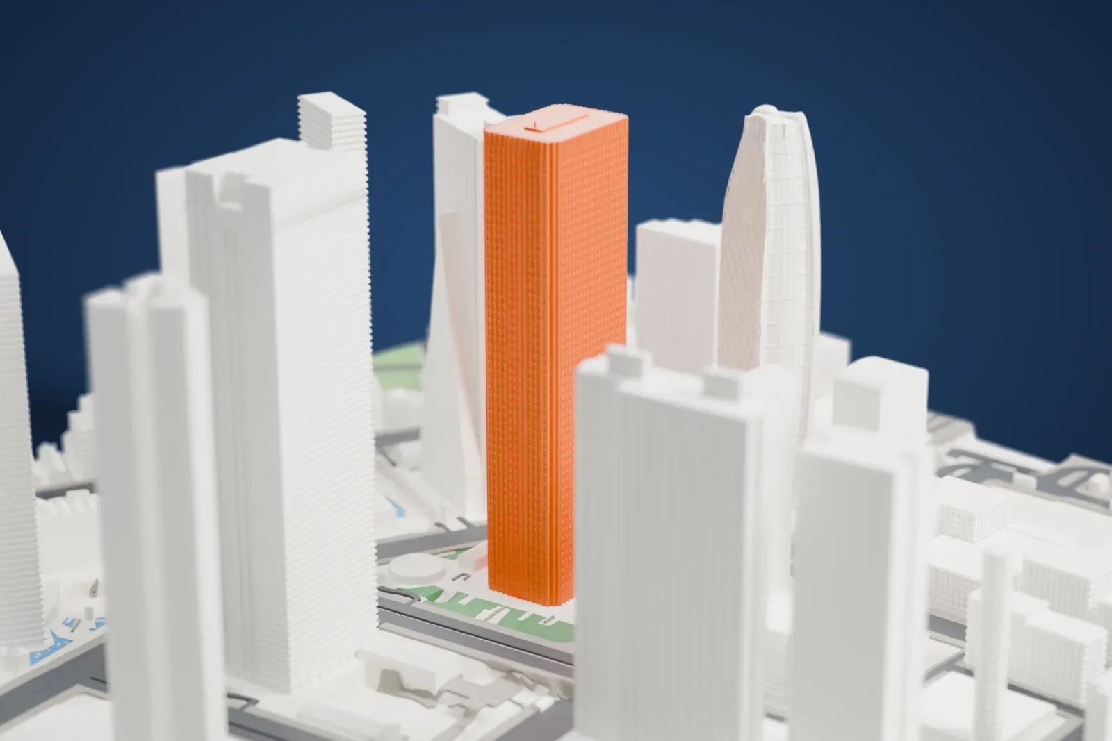 A white 3D print of the Shinjuku Center Building in Tokyo, surrounded by streets and buildings.