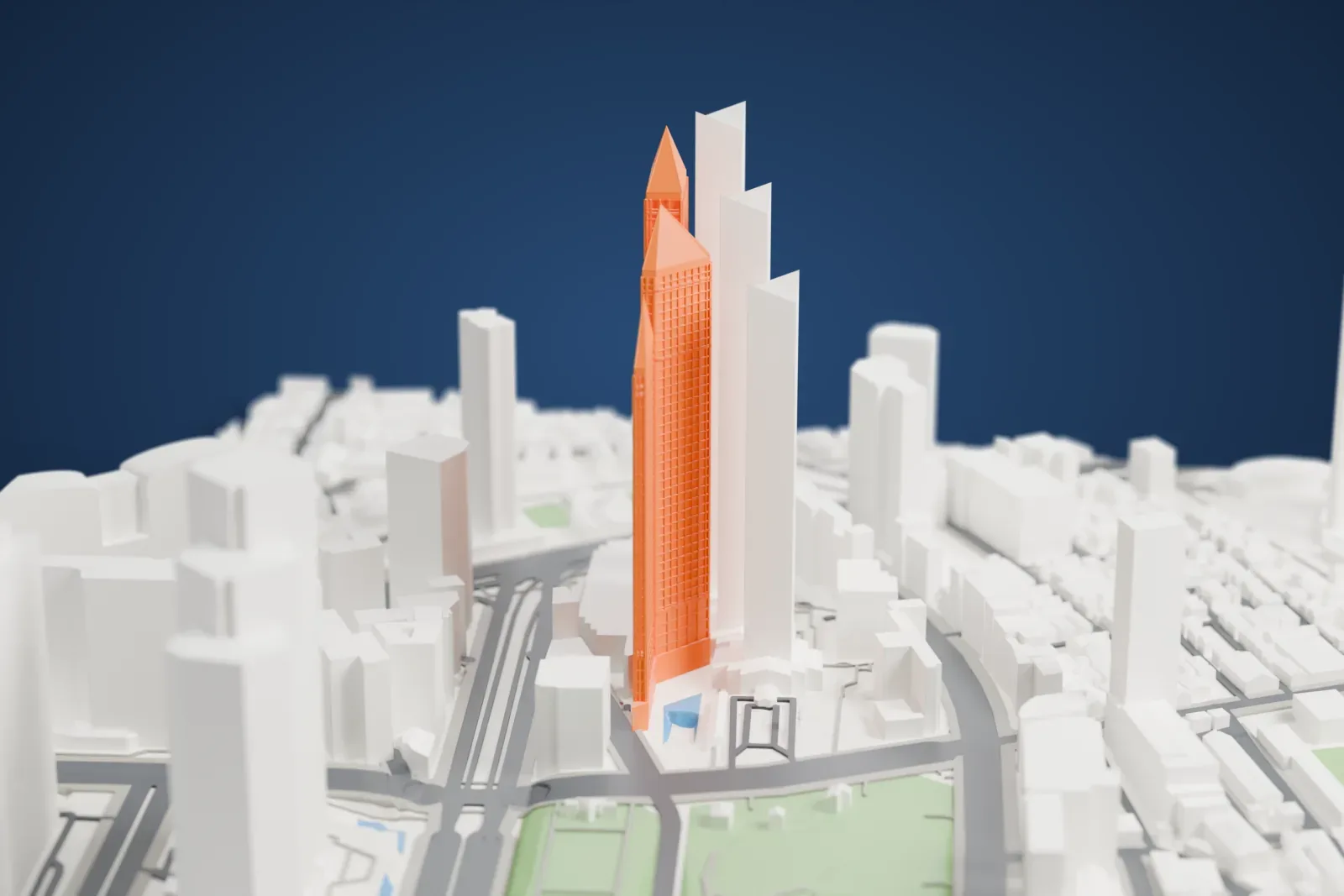 A white 3D print of Shinjuku Park Tower, a tall office tower, among surrounding streets and buildings in Tokyo.