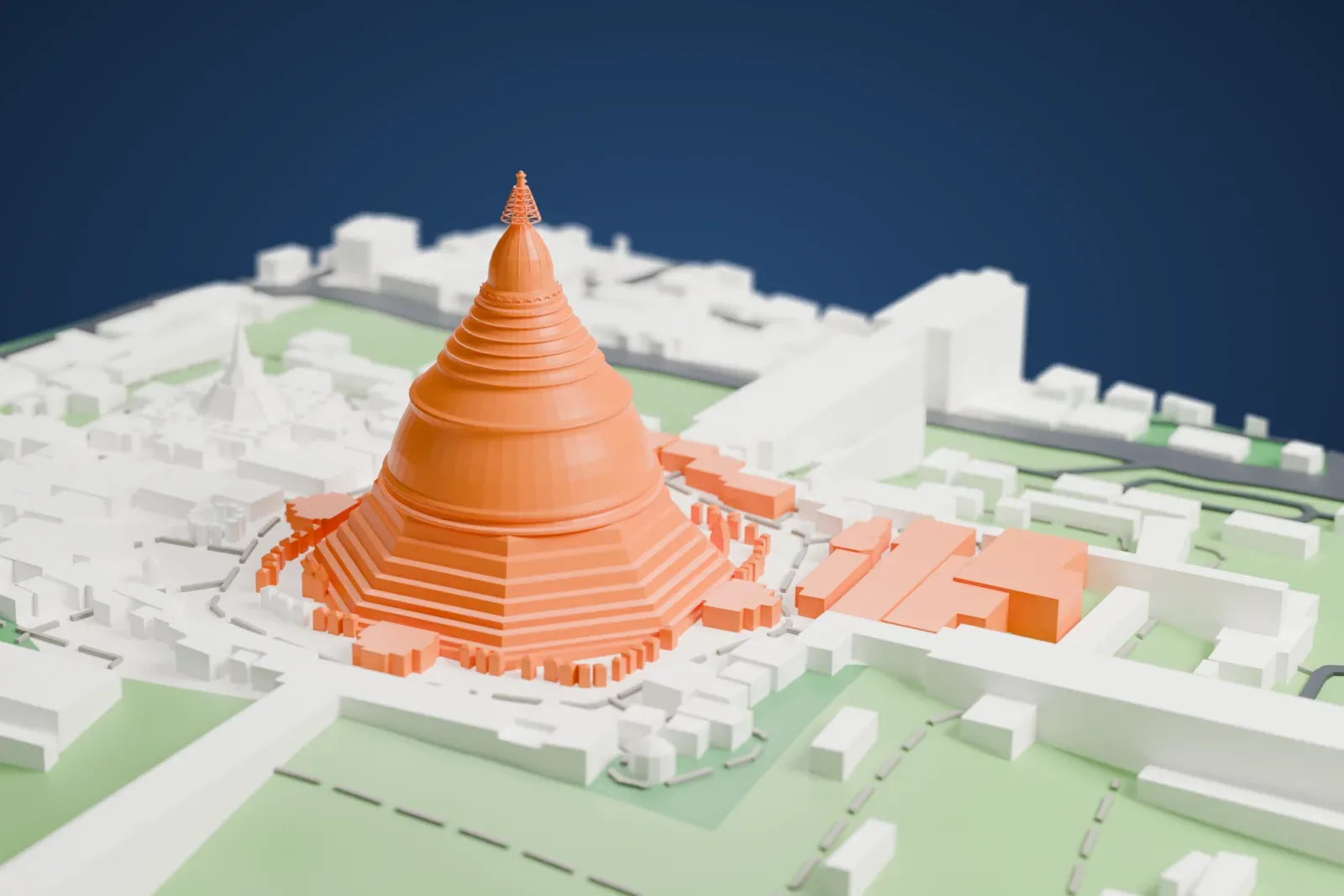 A white 3D print of the Shwedagon Pagoda, a tall bell-shaped stupa on a stepped octagonal base with a fine crown, set on a wide platform among low buildings and green ground.