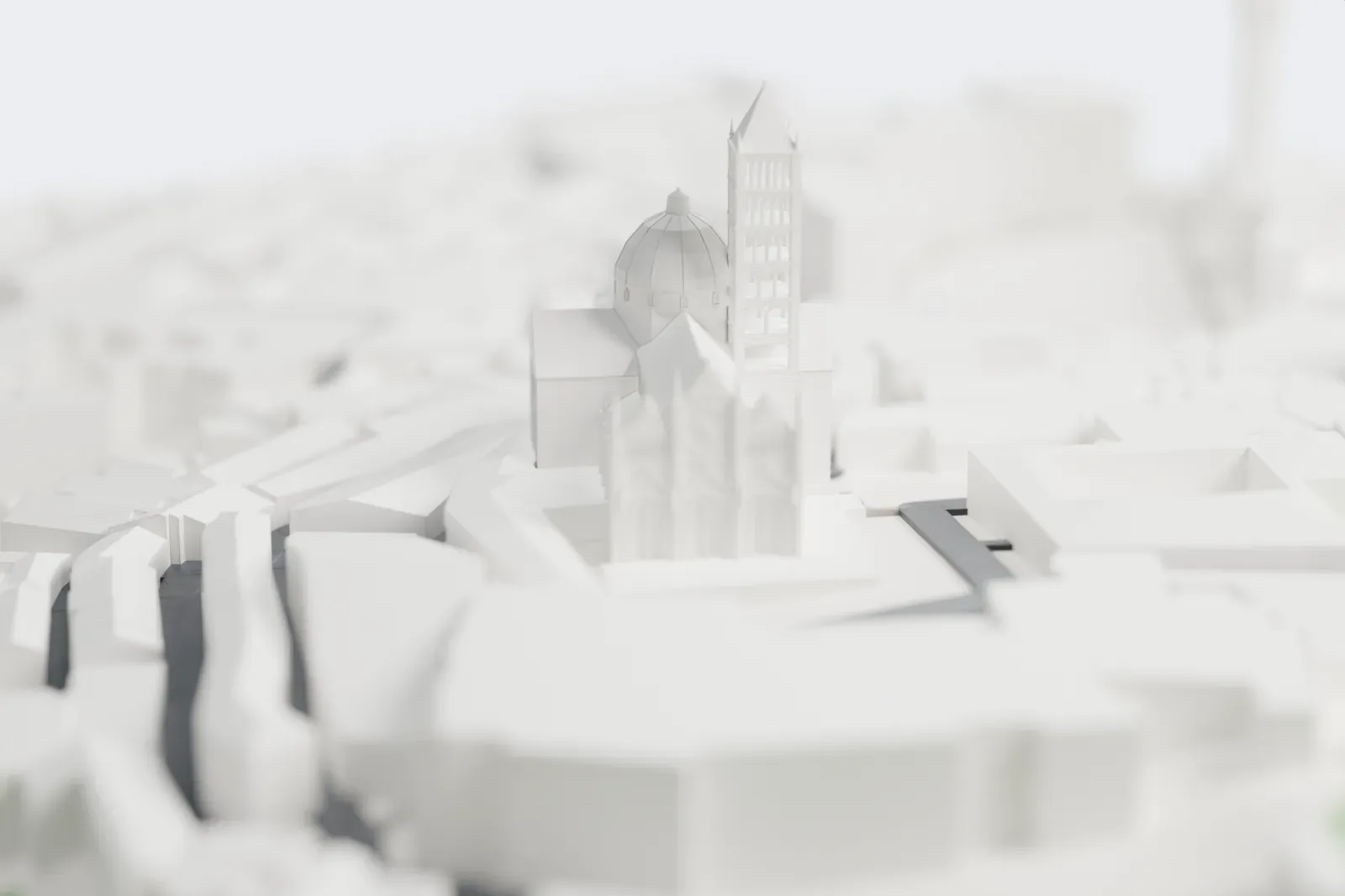 A white 3D print of Siena Cathedral, with a tall bell tower, a ribbed dome and a gabled façade with pinnacles, packed in among dense city buildings.