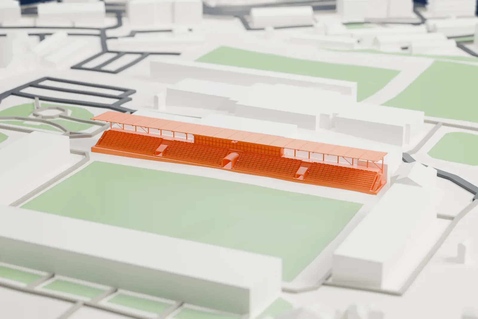 A white 3D print of SKB-Bank Arena, a long grandstand with a flat roof on slender columns beside a pitch, surrounded by large buildings.