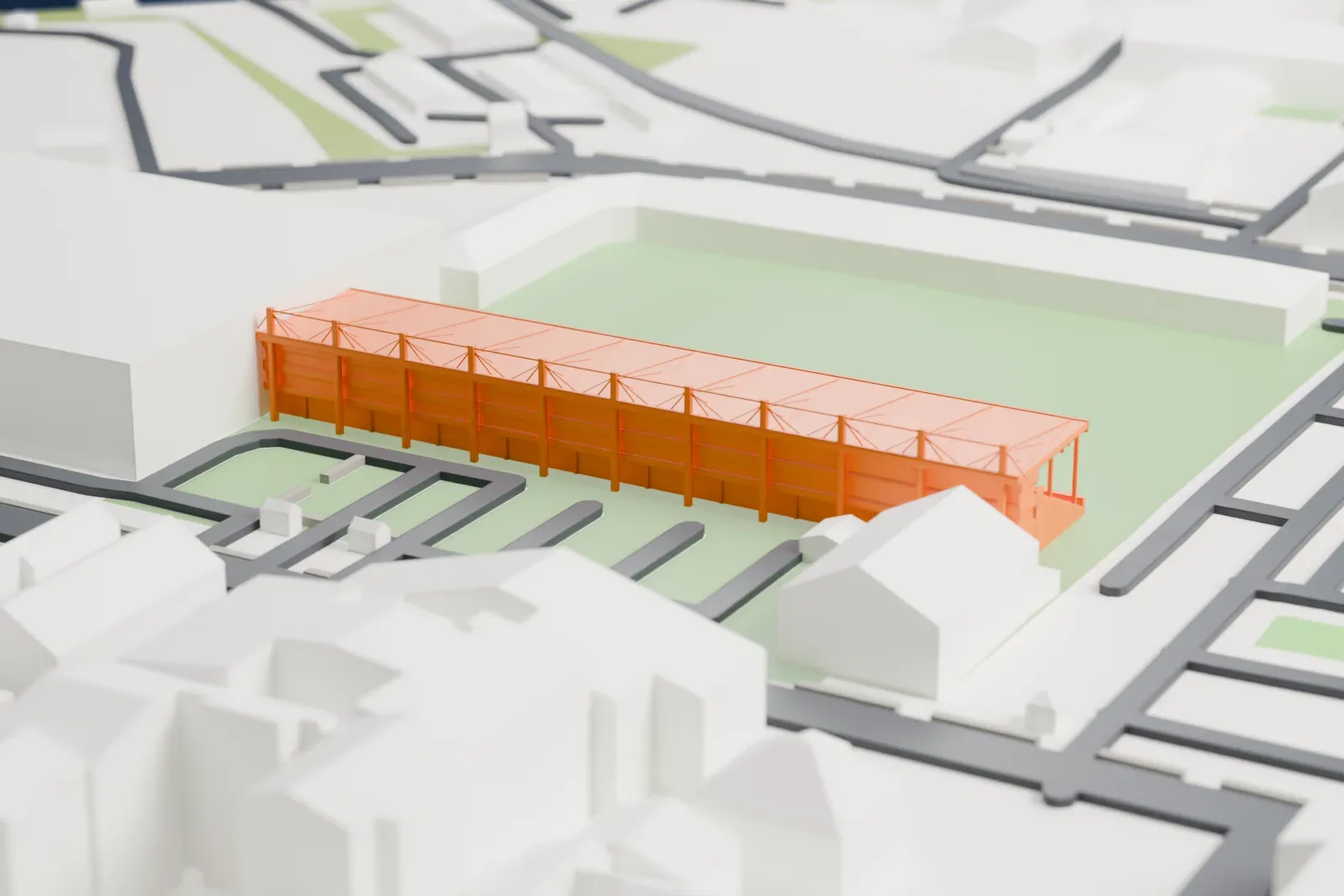 A white 3D print of Skonto Stadium's main stand, a single stepped tier under a long flat roof with a row of mast heads above it, among the streets and buildings around it.