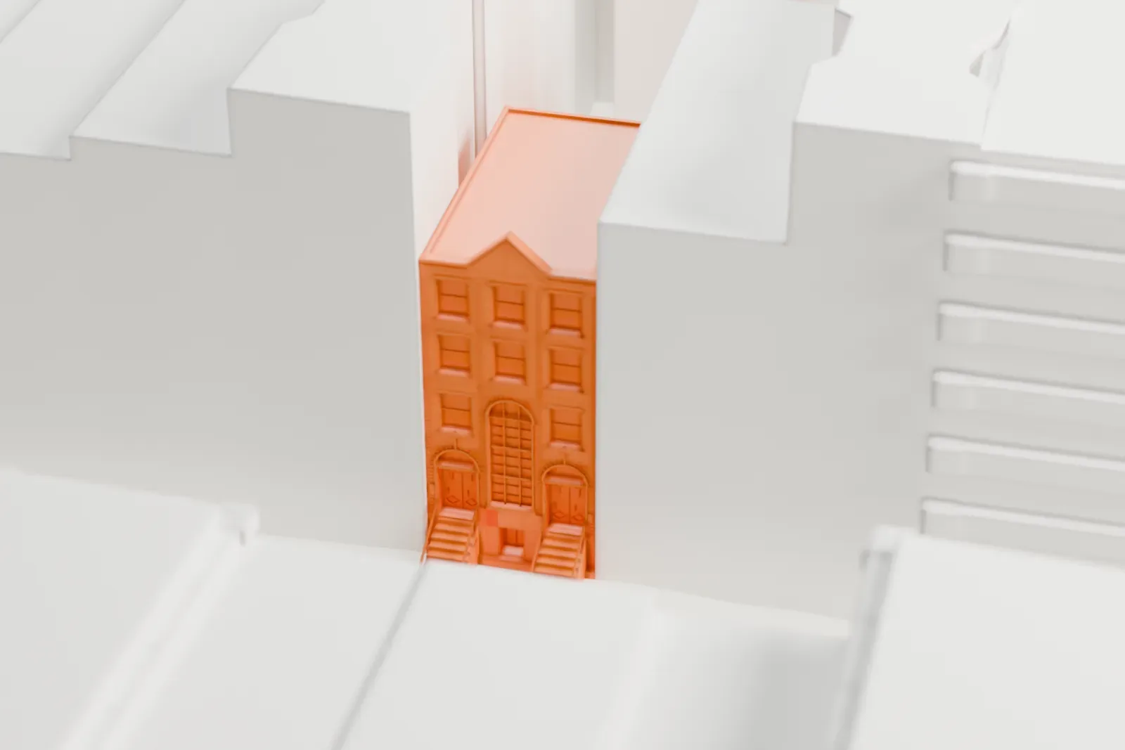 A white 3D print of the Slovenian Church of St. Cyril, a small narrow building that is hard to pick out in a wide area of dense low and tall buildings.