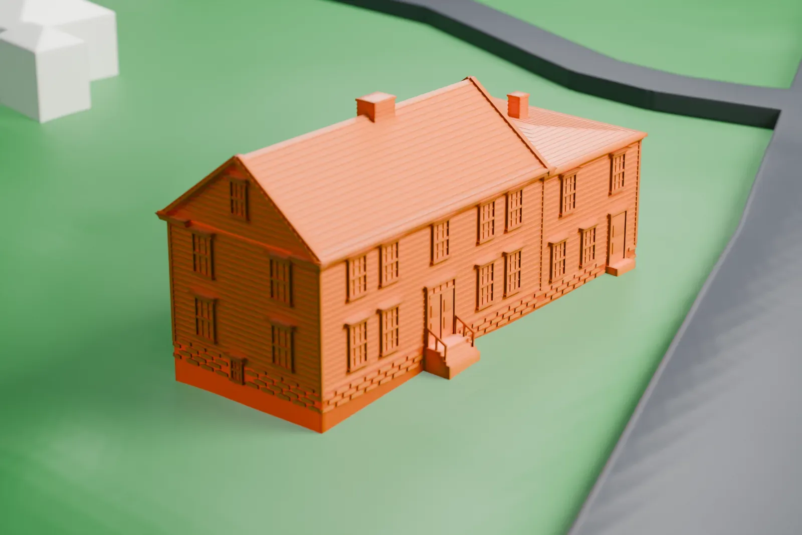 A white 3D print of the Smith Tavern, a two-story frame building with gabled roofs and a chimney, standing on grass beside a road.