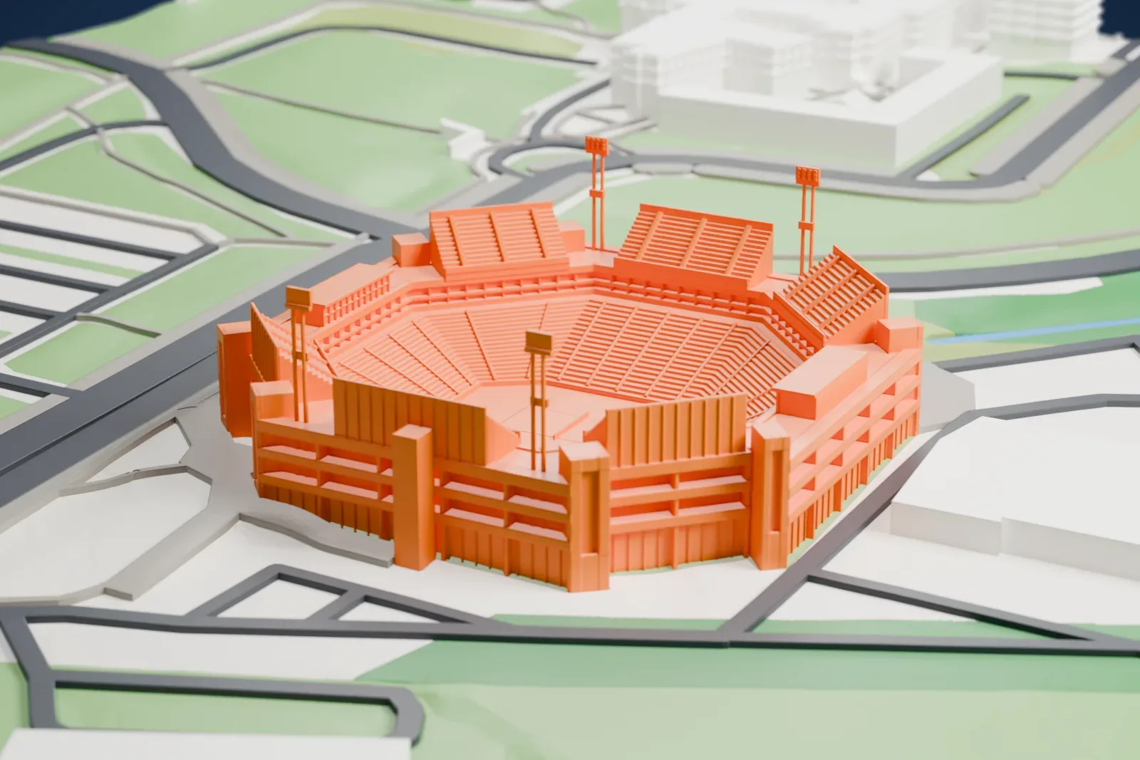A white 3D print of Sobeys Stadium, a tennis stadium among the surrounding streets and buildings.