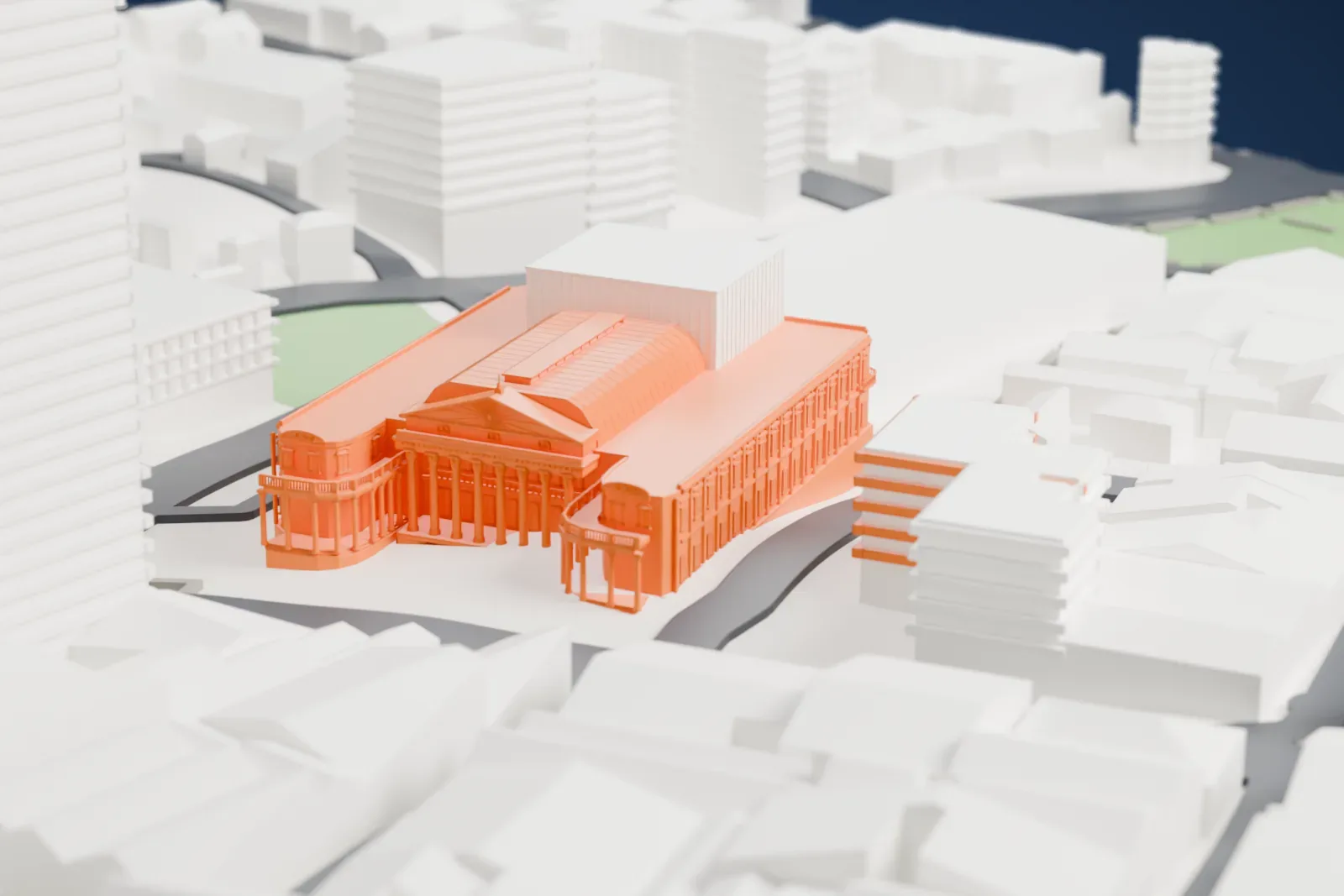 A white 3D print of Solís Theatre, a large columned building with a ribbed roof over its hall, set among taller buildings and narrow streets.