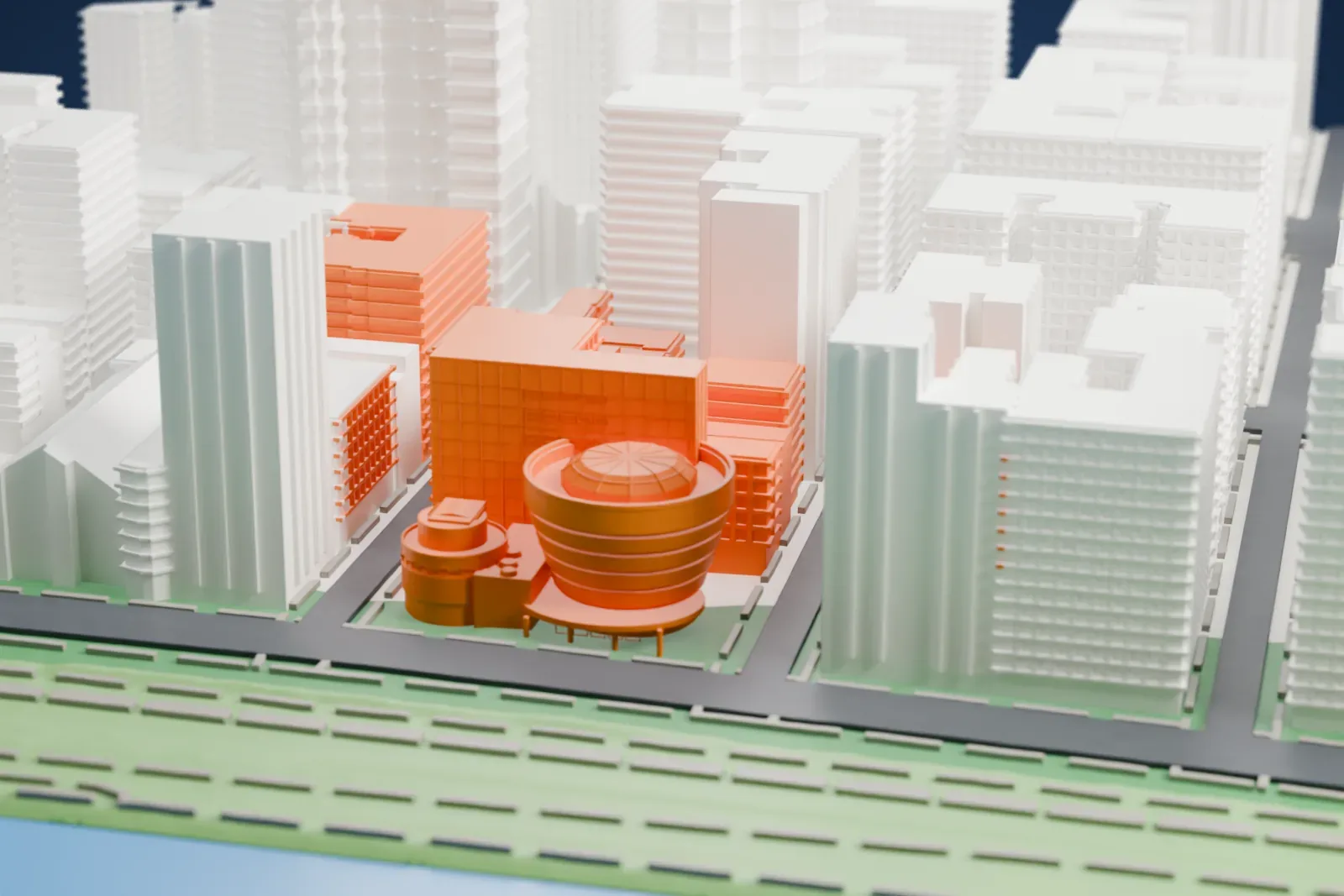 A white 3D print of the Solomon R. Guggenheim Museum, with its bowl-shaped main gallery, small round wing and tall annex, set among taller buildings with a road and park areas beside it.