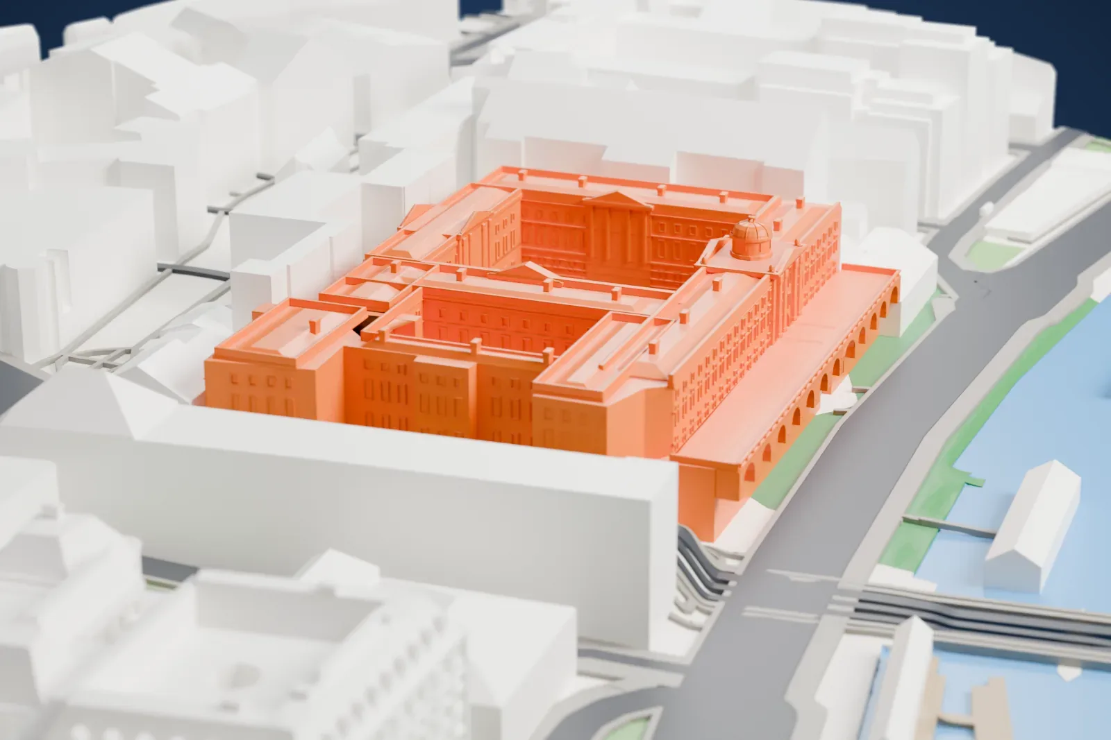 A white 3D print of Somerset House, a broad neoclassical building with long outer wings around a central court, among the streets and buildings of central London.