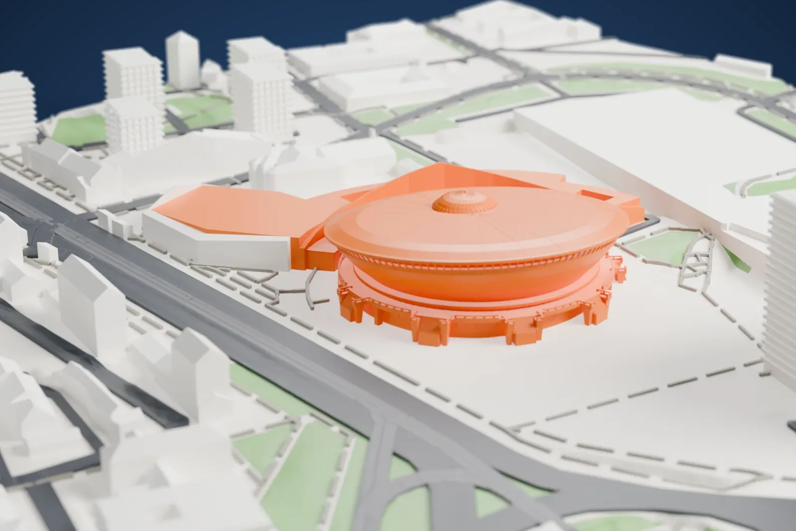A white 3D print of the Spodek, a wide saucer-shaped arena with a small dome at the center of its roof, standing among large neighboring buildings and roads.