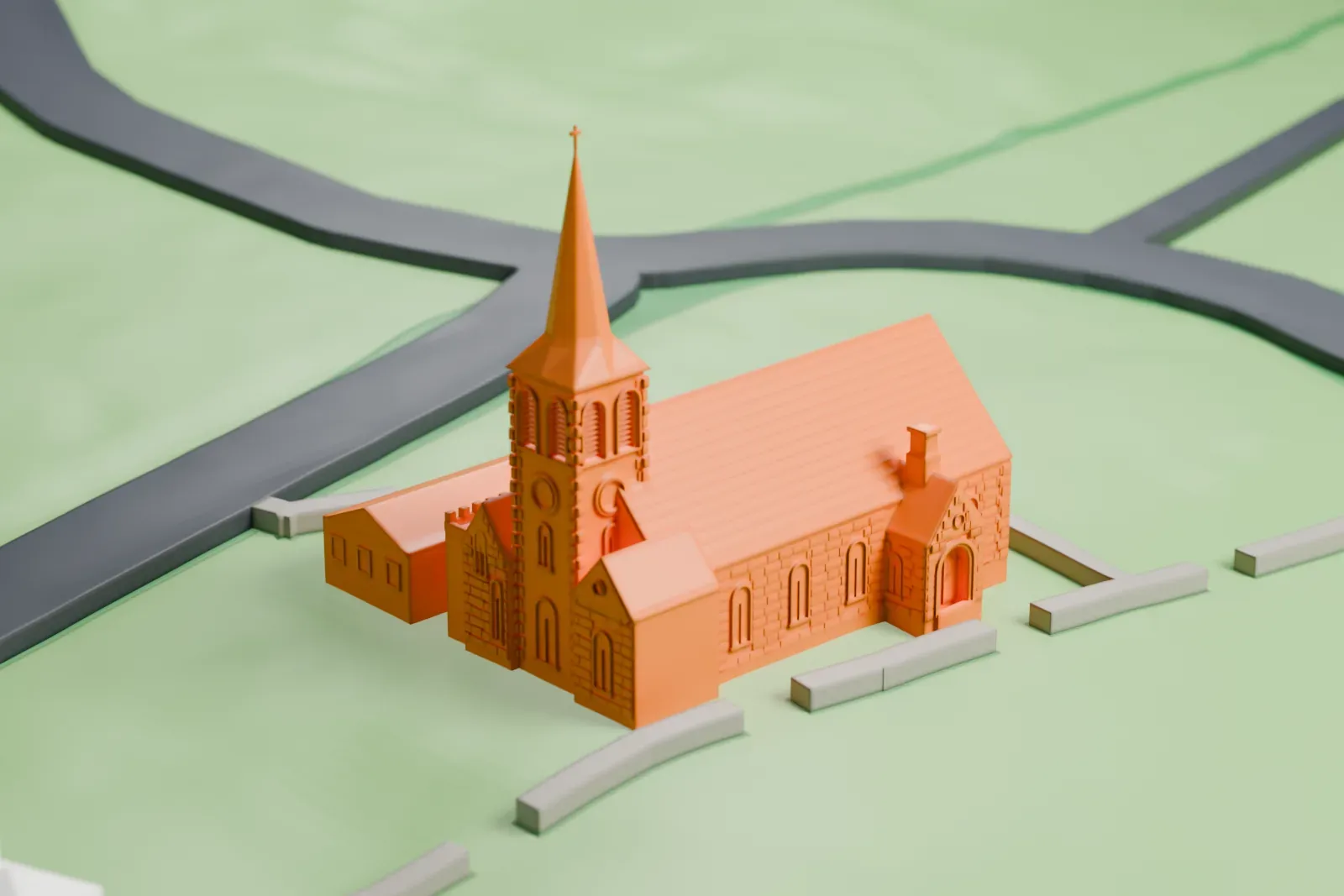 A white 3D print of St. Andrew's Church, a long pitched-roof church with a tall spire at one end, standing on a green lawn beside a road and a small stream.