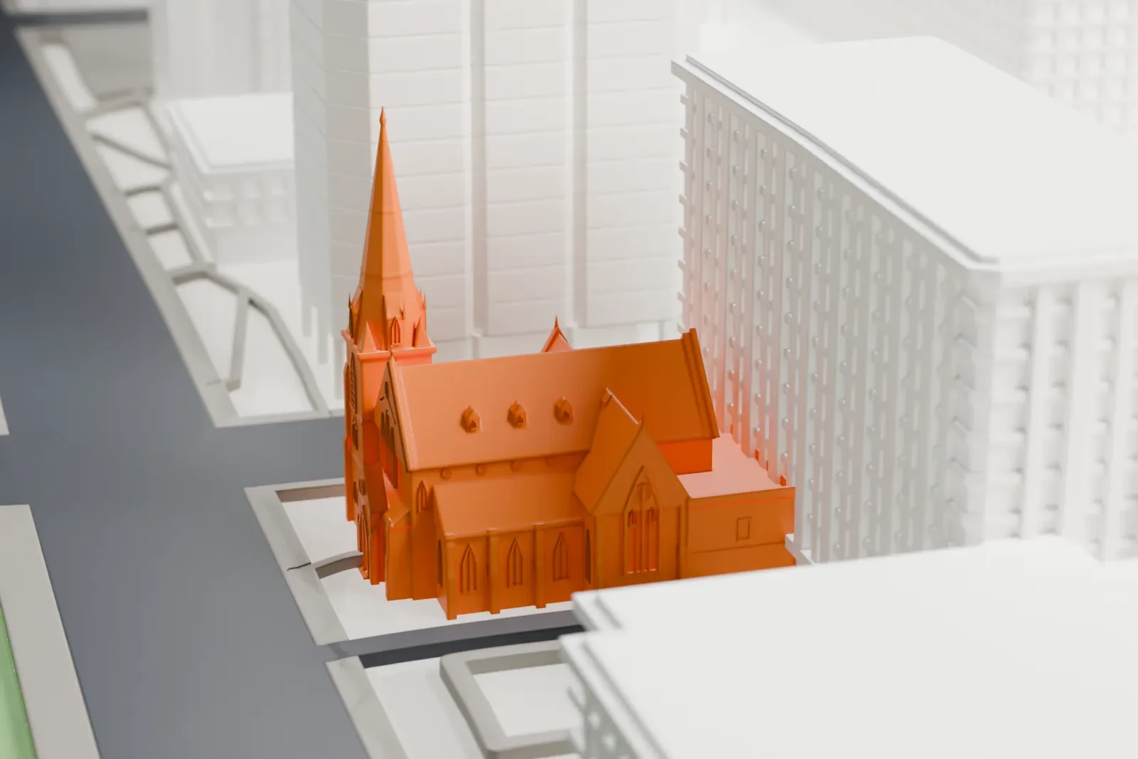 A white 3D print of St. Andrew's Presbyterian Church in Ottawa, standing among the surrounding streets and buildings.