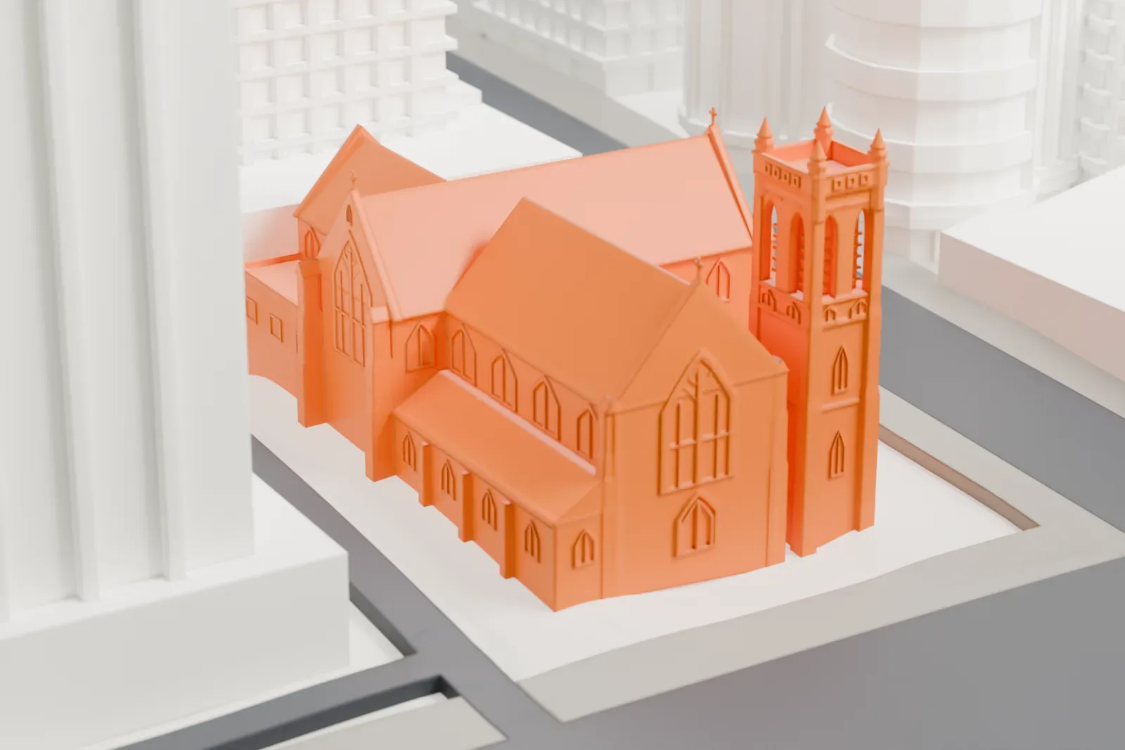 A white 3D print of St. Andrew's-Wesley United Church among the surrounding streets and buildings.