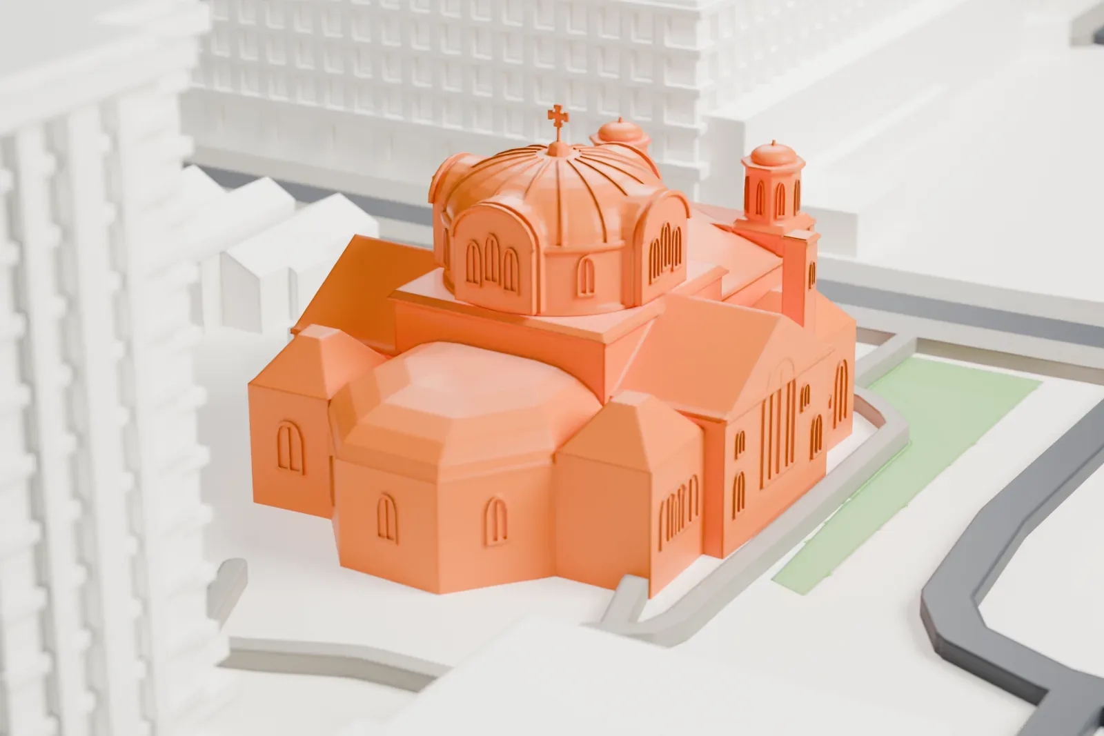 A white 3D print of St. Anne's Anglican Church, a domed church, among the surrounding streets and buildings.
