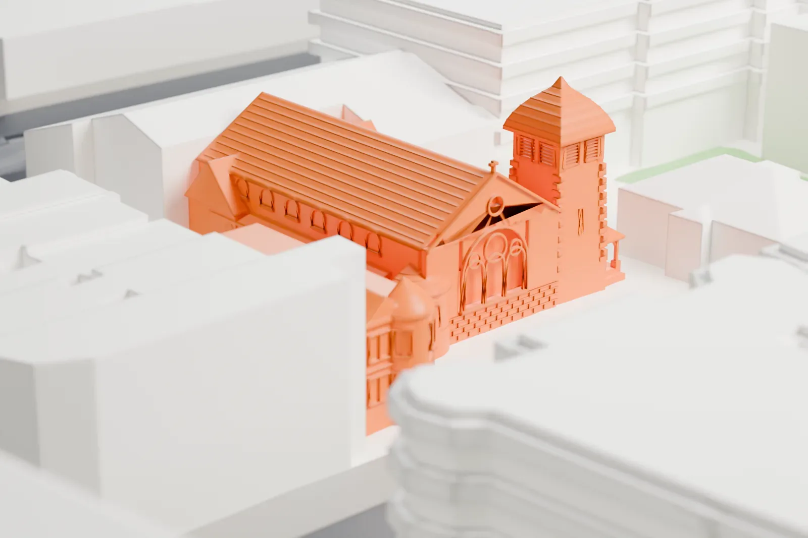 A white 3D print of St. Bartholomew's Church and Rectory, a gabled church with a squat tower beside a separate rectory with twin gables, set among taller buildings.