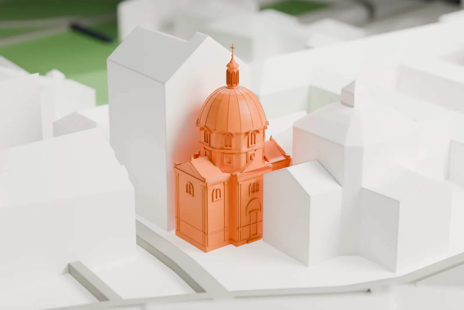 A white 3D print of St. Casimir Church, a domed church on a market square among surrounding buildings.