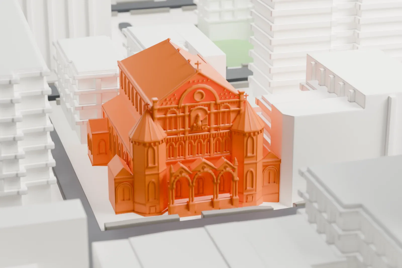 A white 3D print of St. Cecilia Church, a gabled church with arched windows and a small corner turret, closely hemmed in by much larger buildings.