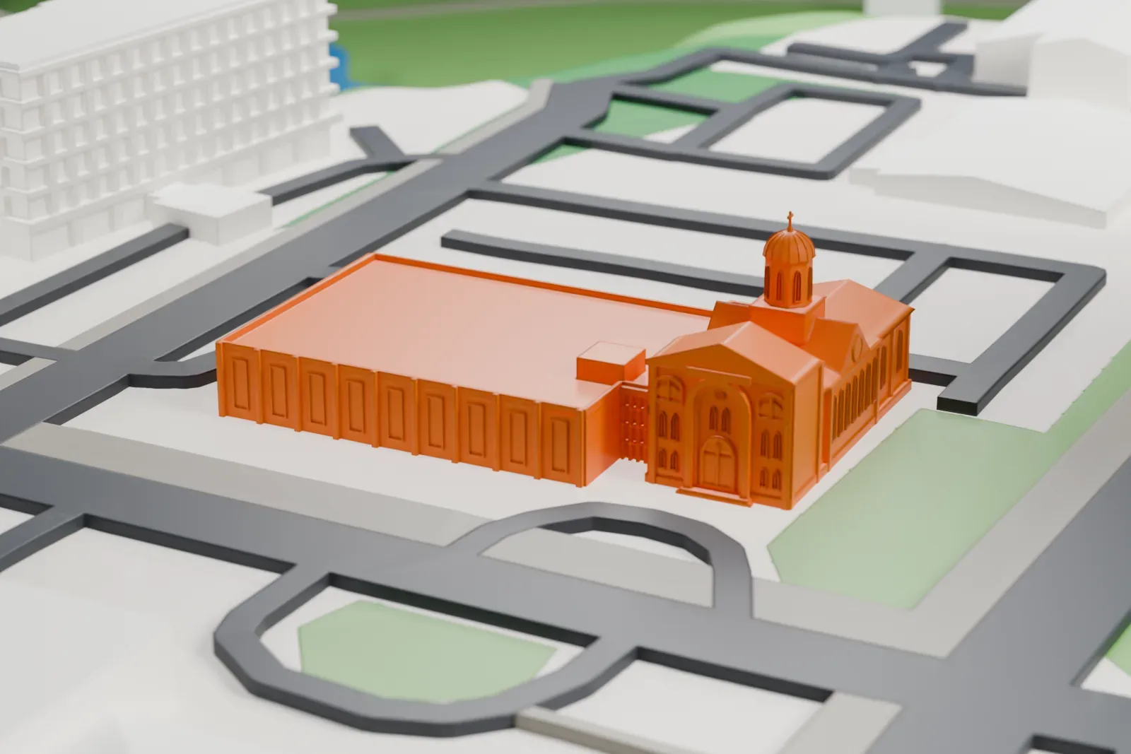 A white 3D print of St. Clement of Ohrid Macedonian Orthodox Cathedral, with surrounding streets and buildings.