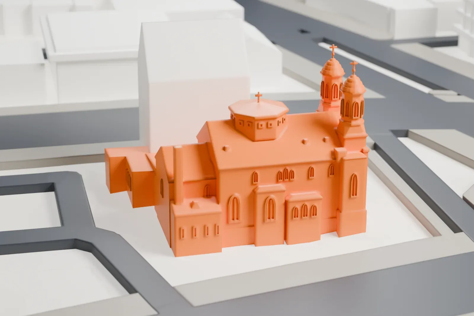A white 3D print of St. George Antiochian Orthodox Church with the surrounding streets and buildings.