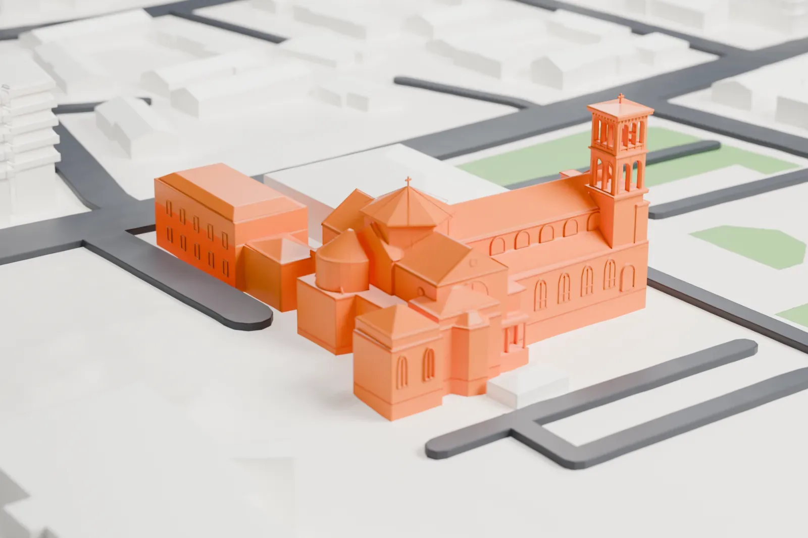 A white 3D print of St. Lucy's Church, a church with a slim bell tower and rounded apses, standing among city streets, parking areas and low buildings in Newark.