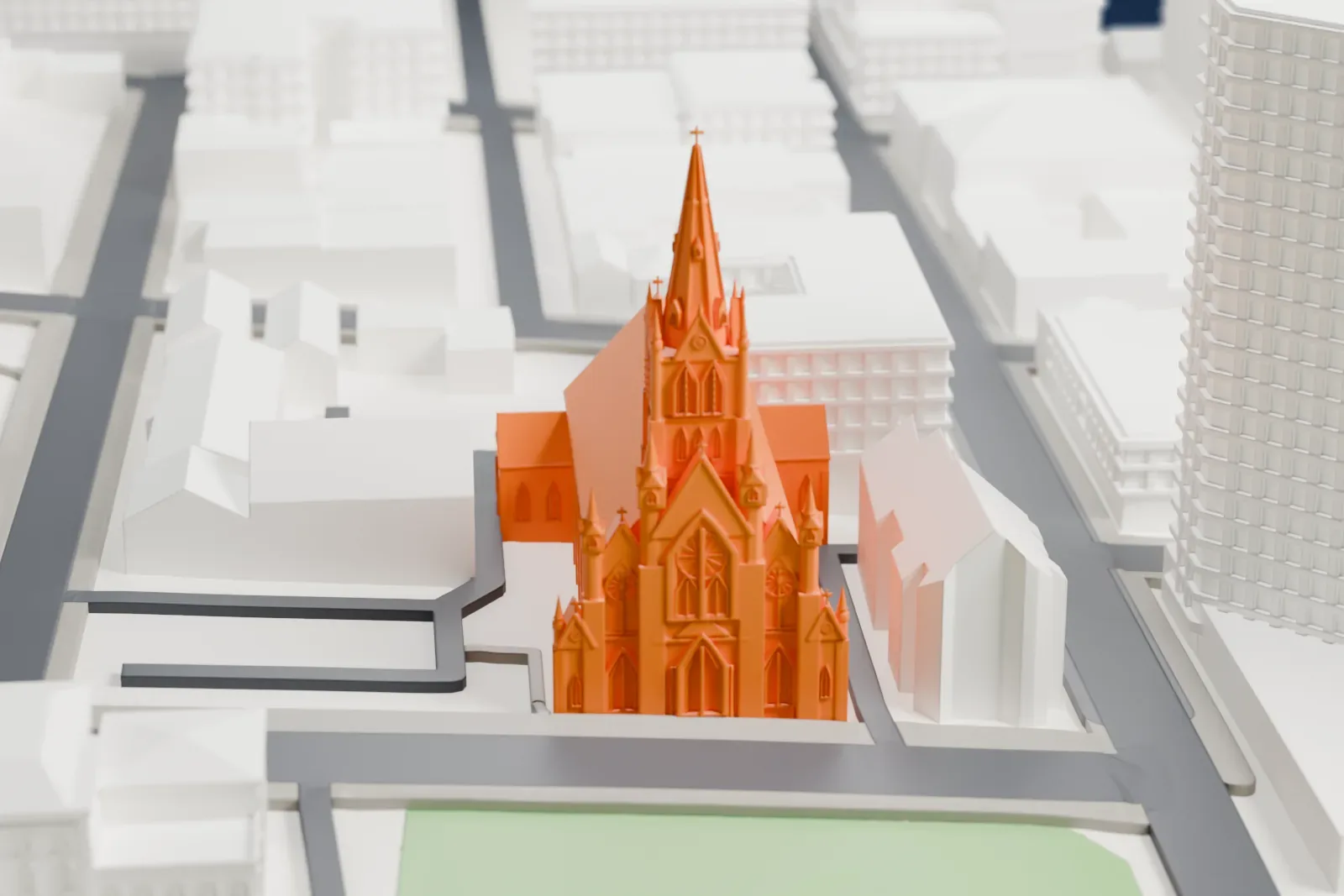 A white 3D print of St. Mary's Basilica in Halifax, with the surrounding streets and buildings around it.