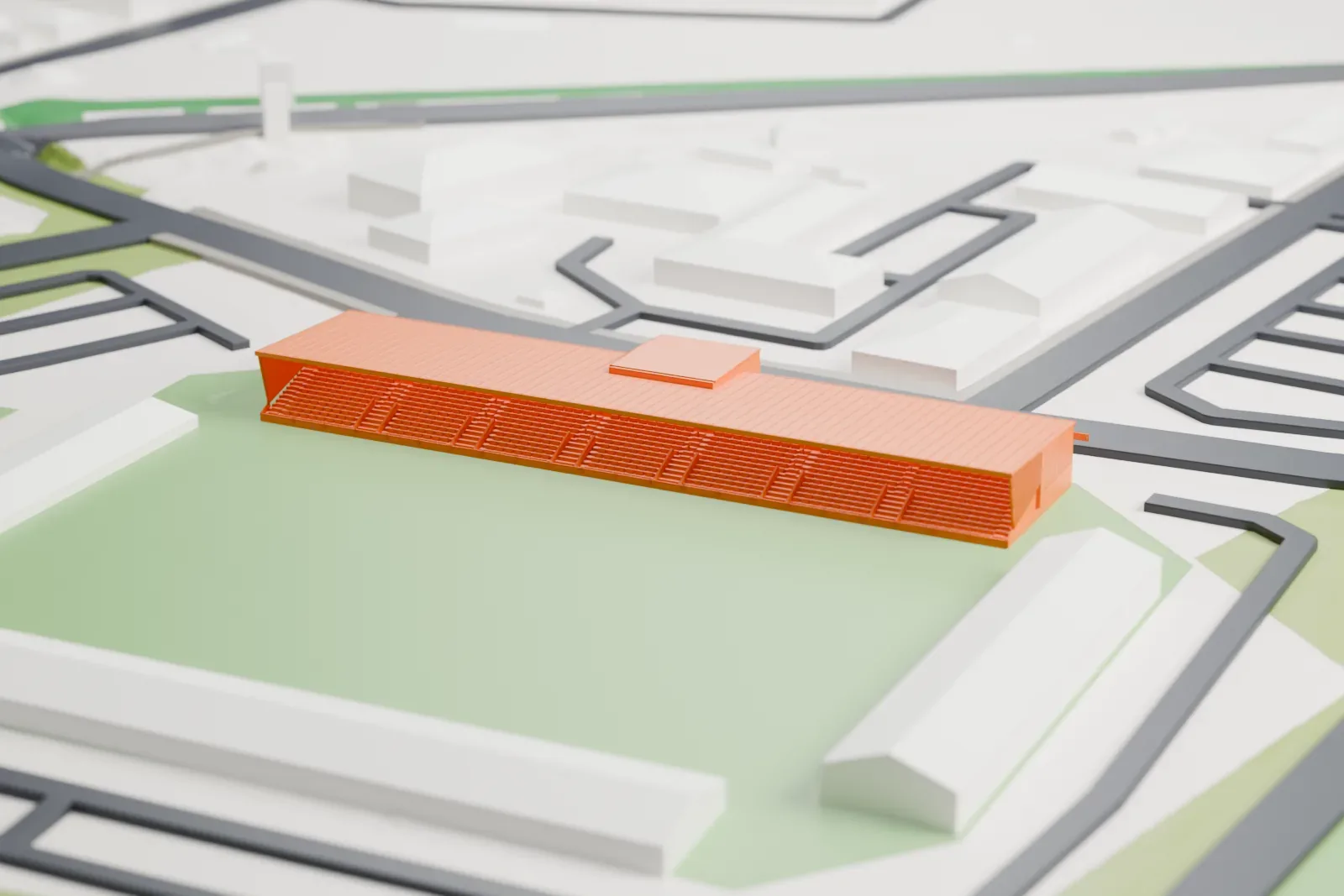 A white 3D print of the Main Stand at St Mirren Park, a long stand with a shallow cantilevered roof and a taller central entrance, among the surrounding streets and buildings of Paisley.