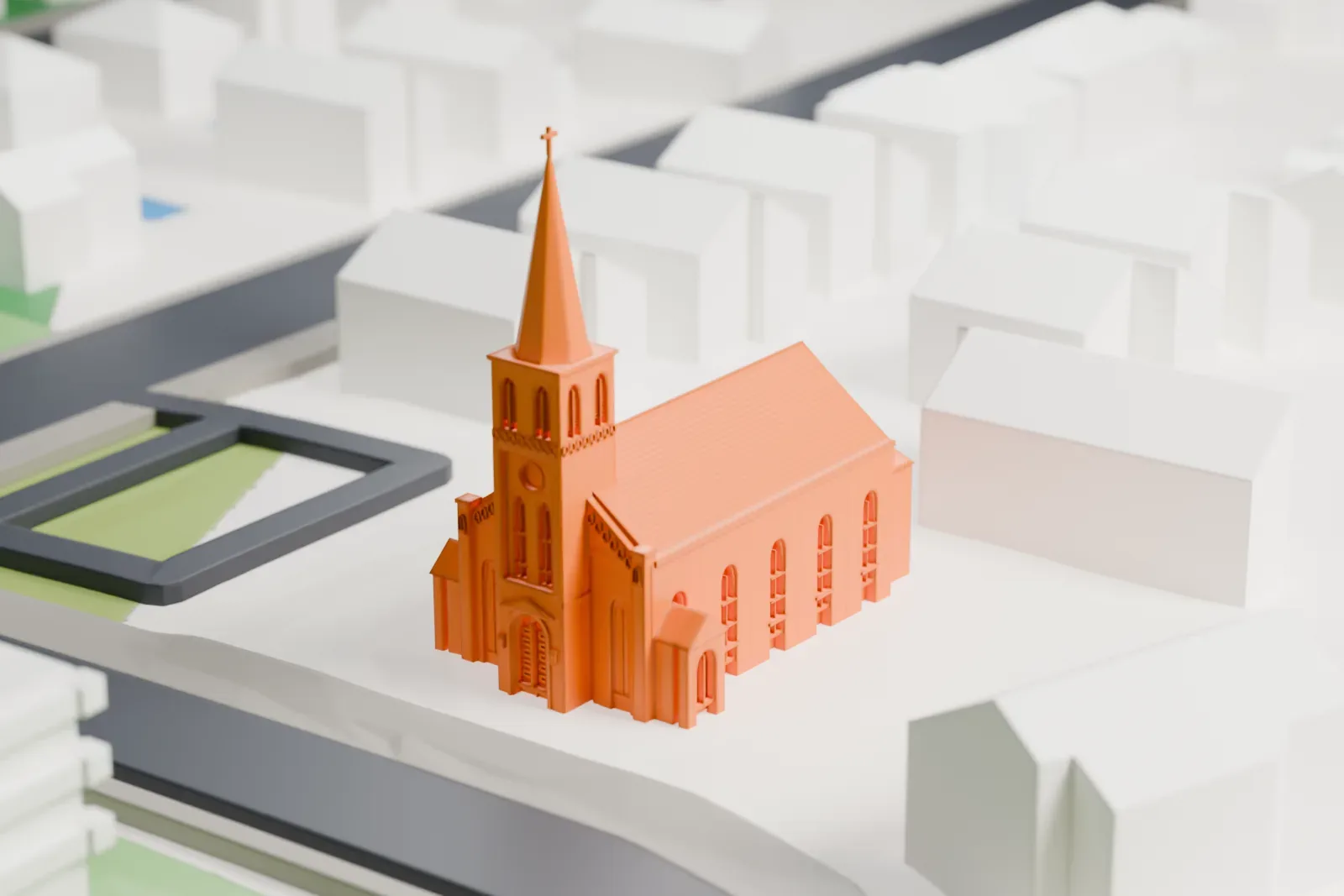 A white 3D print of St. Patrick's Church on Staten Island, a gabled church with a tall slender steeple, surrounded by streets and small buildings.