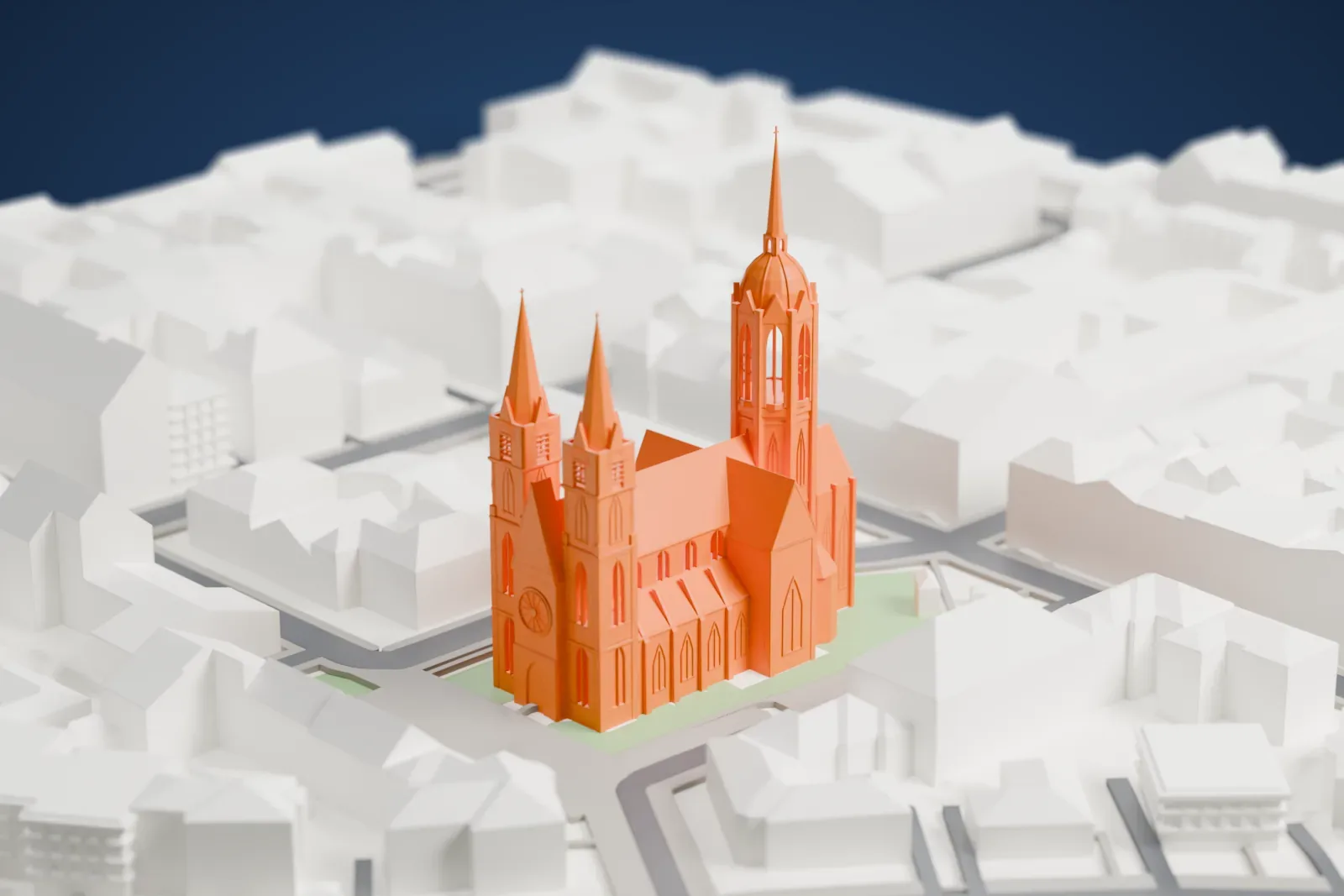 A white 3D print of St. Paul's Church in Munich, with the surrounding streets and buildings around it.