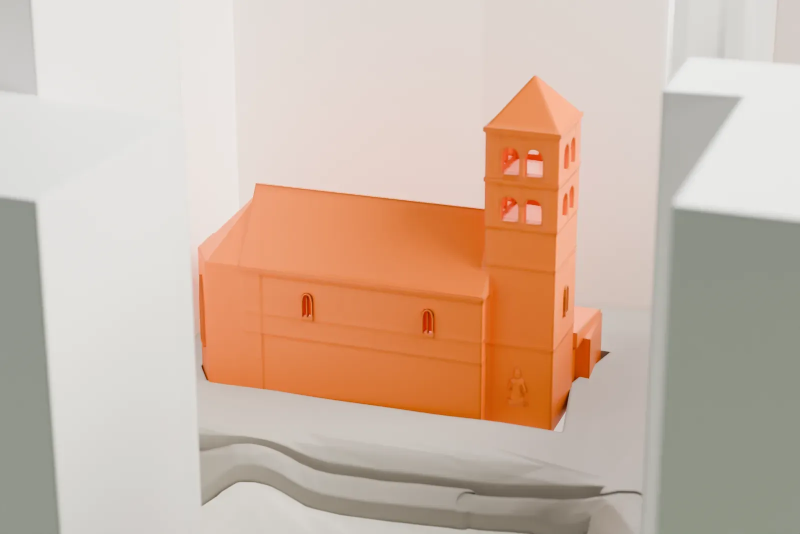 A white 3D print of St. Rupert's Church, a small Romanesque church standing among the surrounding old-city buildings.