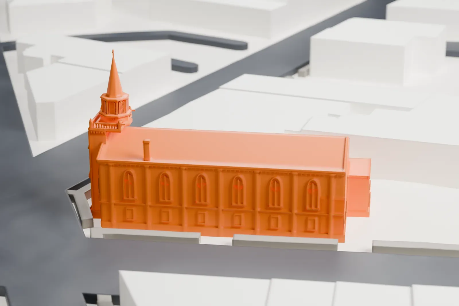 A white 3D print of St. Stephan's Church with its corner tower and spire, set among surrounding buildings and streets.