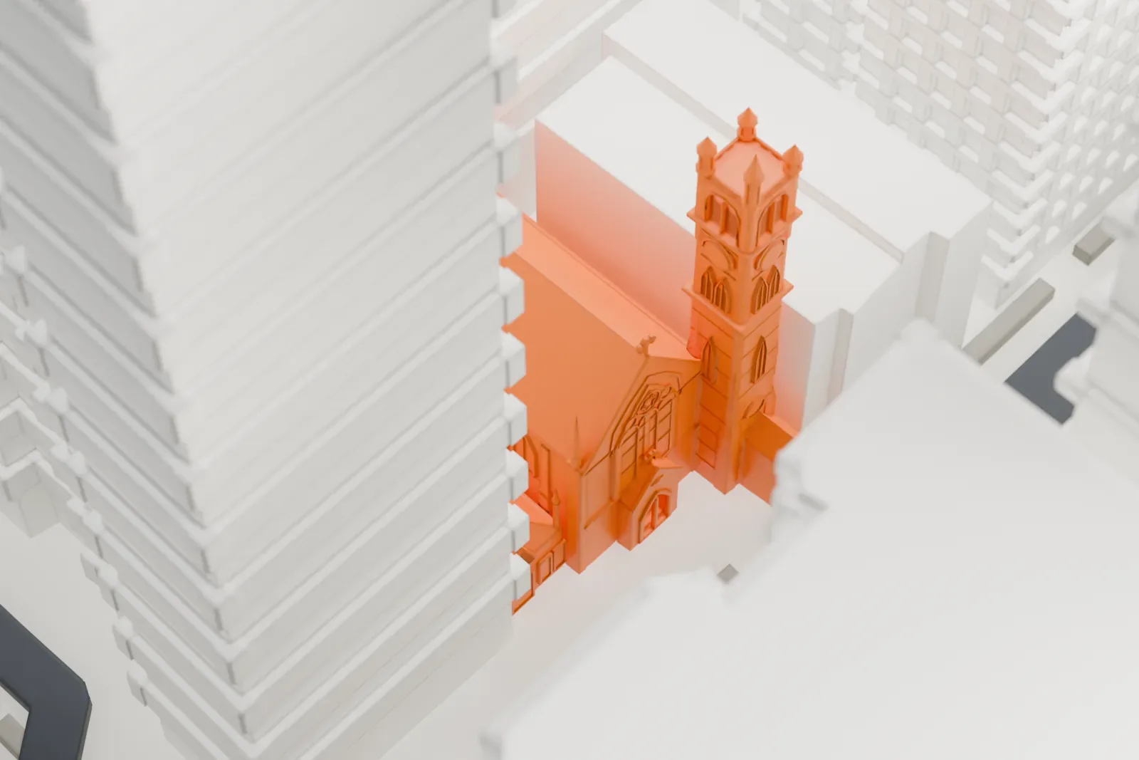 A white 3D print of St. Thomas More Church, a Gothic-style church with a pointed gable and a tall square tower, squeezed between much taller buildings.
