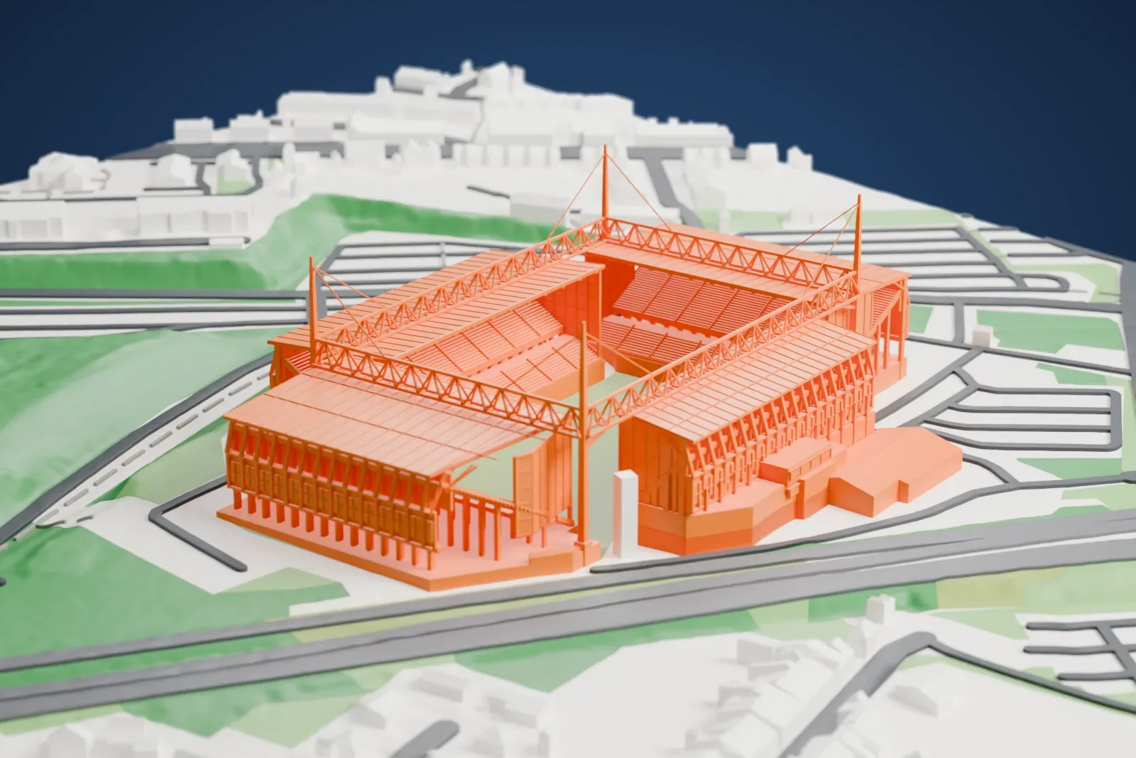 A white 3D print of Stade Bollaert-Delelis, a four-sided football stadium with lattice roof trusses and tall corner masts, set among roads, grassy slopes and small houses.