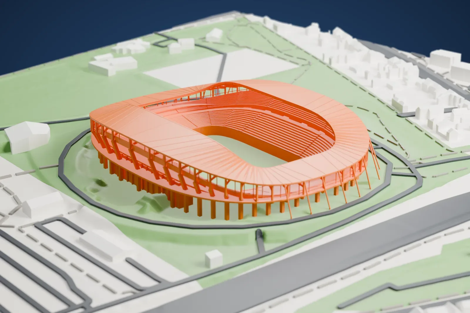 A white 3D print of the Stade de la Beaujoire, an oval roofed stadium on slender pillars, set in green grounds with ring roads and a few buildings nearby.