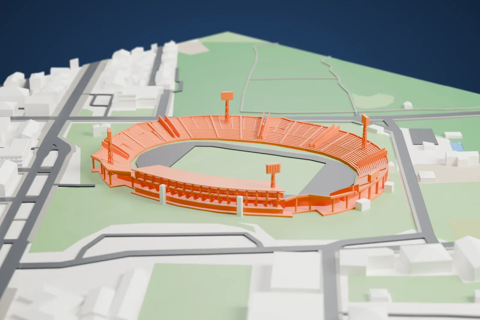 A white 3D print of Stadio Adriatico – Giovanni Cornacchia, an oval stadium, surrounded by streets and buildings.