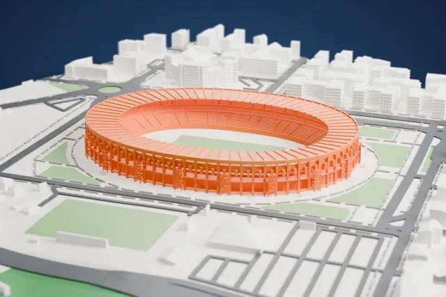 A white 3D print of the Stadio Marcantonio Bentegodi, a low oval bowl under a continuous ring roof with columns and stair towers around it, among the surrounding streets and buildings.