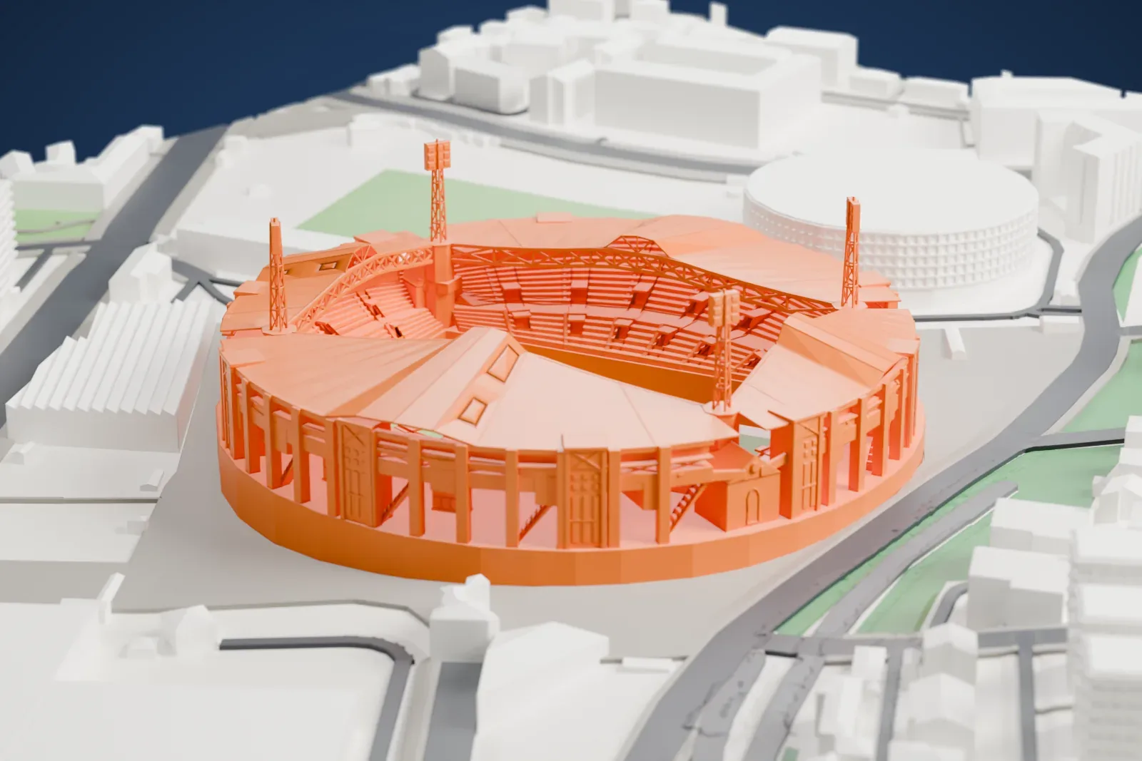 A white 3D print of the Stadio Nereo Rocco, a circular football stadium with four separate stands, among the surrounding streets and buildings.