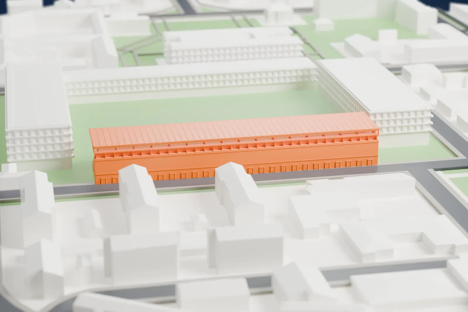 A white 3D print of the long covered grandstand of Stadio Paolo Mazza, with a truss-supported roof and tiered seats, among surrounding streets and buildings.