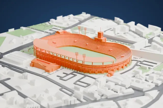 A white 3D print of Stadio Renato Dall'Ara, an open oval stadium with an arcaded outer wall, a central tower and a curved roof over one side, surrounded by streets and low buildings.