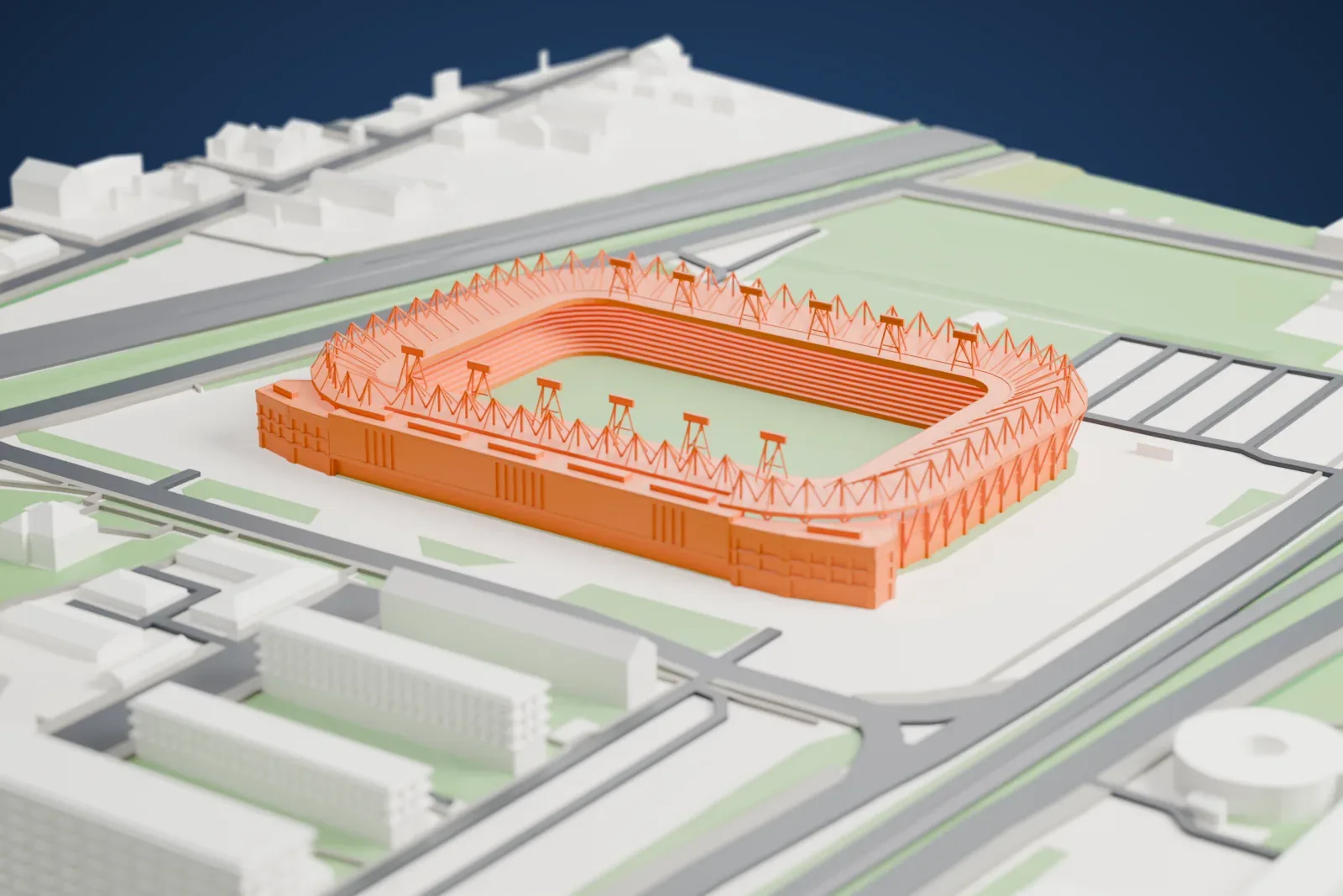 A white 3D print of the Widzew Łódź Stadium, a football stadium, surrounded by streets and buildings.