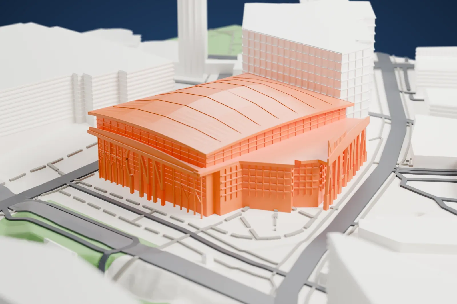 A white 3D print of State Farm Arena, a large hall under a shallow curved roof with a deep canopy along one side and tall columns spelling ATLANTA, among the surrounding streets and buildings.