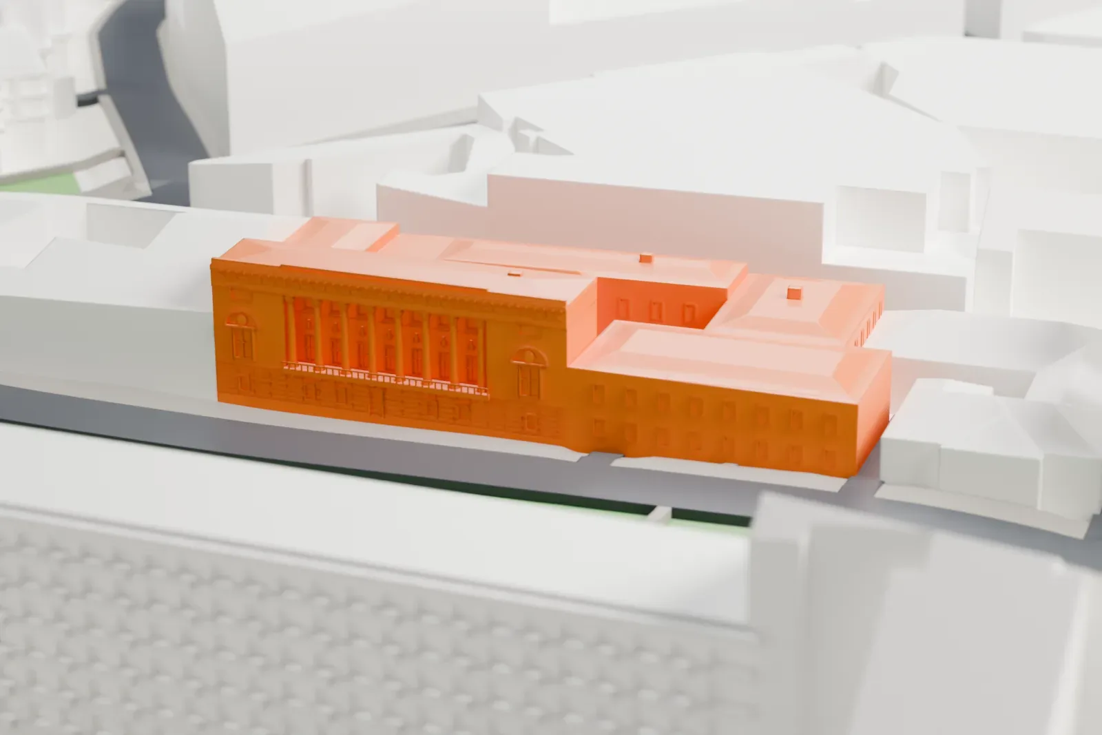 A white 3D print of the State Museum of Oriental Art, a historic building among surrounding streets and buildings.