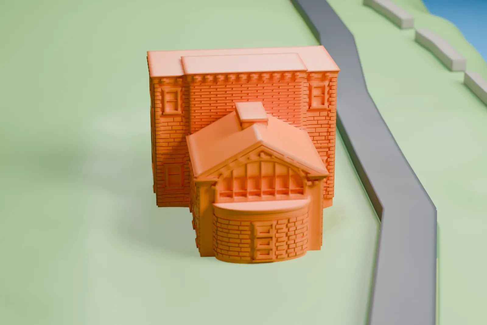 A white 3D print of Strecker Memorial Laboratory, a small building standing in a grassy park beside a curving road, with water on both sides.