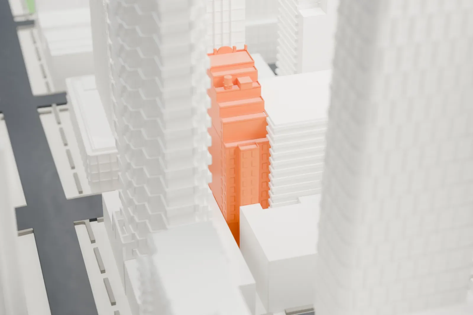 A white 3D print of Studio 54, a theater building among tall, closely packed Midtown towers.