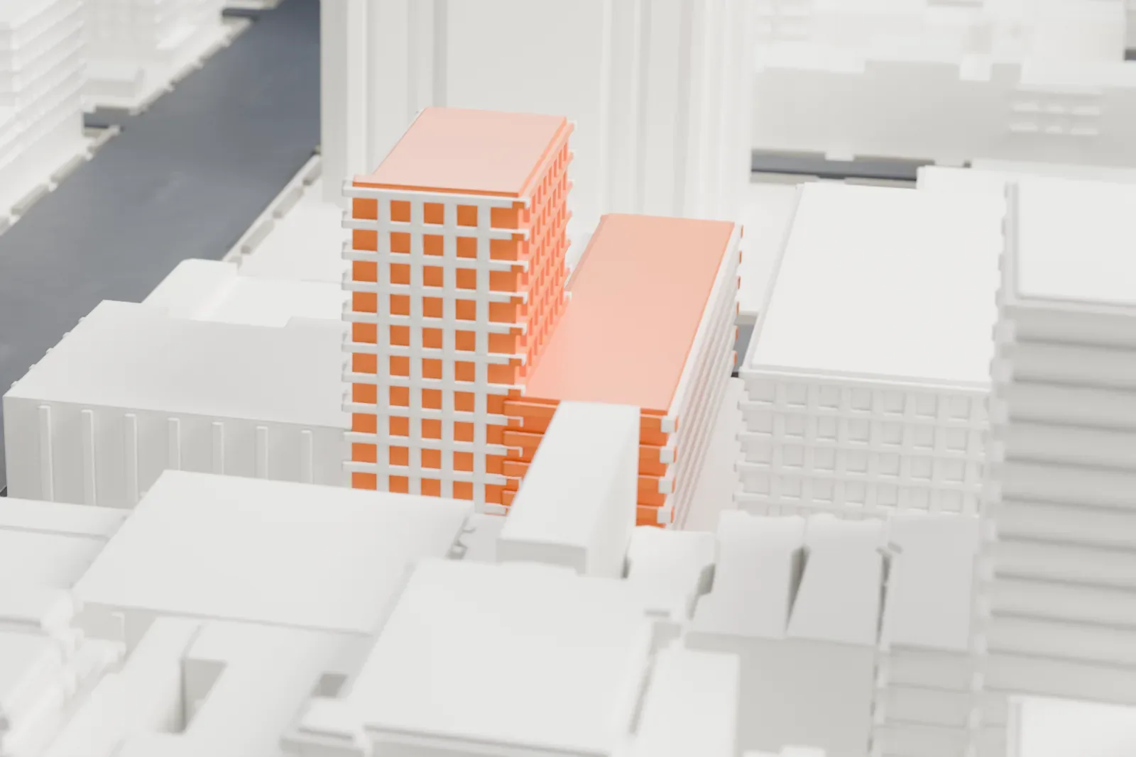 A white 3D print of the Studio Museum in Harlem, a boxy building with an open stair and terraces, among mid-rise buildings.
