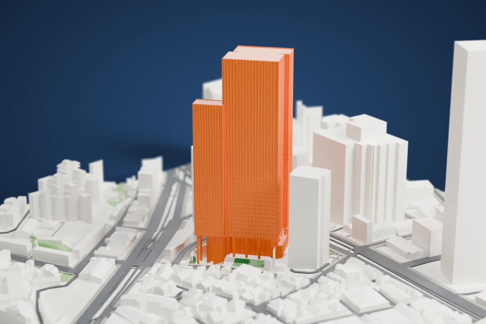 A white 3D print of the Sumitomo Fudosan Roppongi Grand Tower, a tall skyscraper standing among surrounding city buildings.