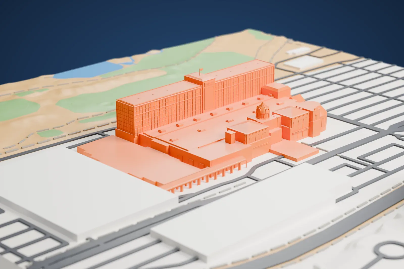A white 3D print of Suncoast Hotel and Casino, a long hotel block with domed rotundas and a long thin colonnade, ringed by parking lots and roads.
