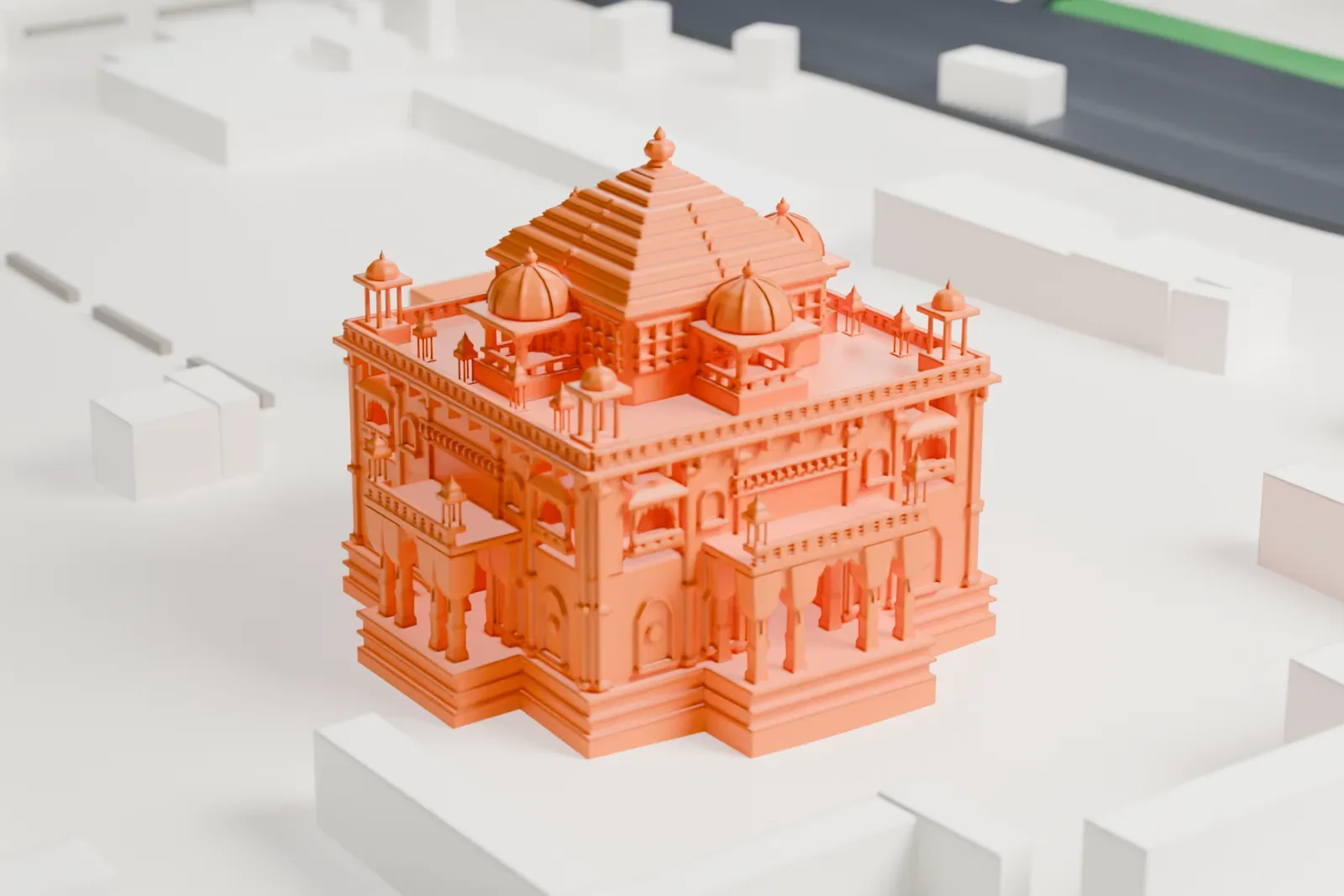 A white 3D print of Swaminarayan Akshardham, a temple with a stepped central roof, small domes and pavilions, and columned porches, with low buildings around it.