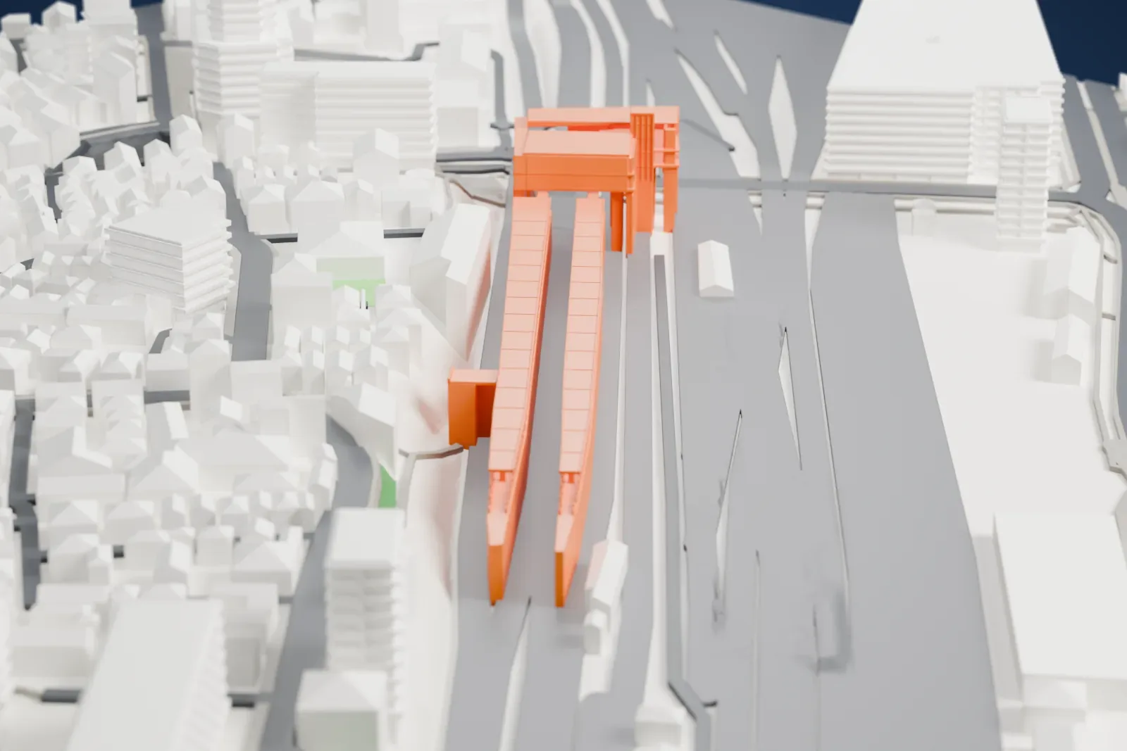 A white 3D print of Tabata Station, a railway station building, among surrounding streets and buildings.